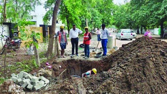 Laying of sewerage pipes and road restoration