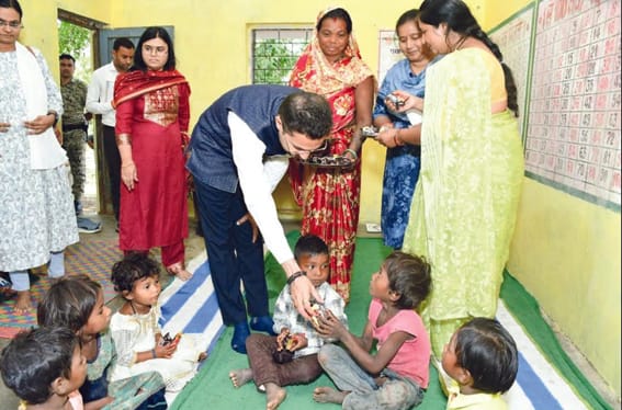 Moringa powder and milk powder to malnourished children