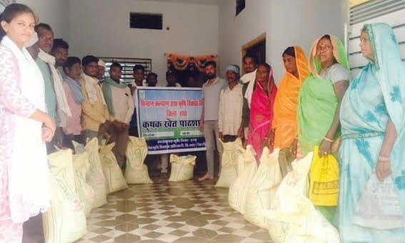 By organizing a "school of farming"