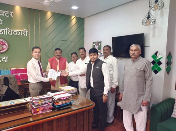 Murlidhar Patil inaugurated a community hall in the village